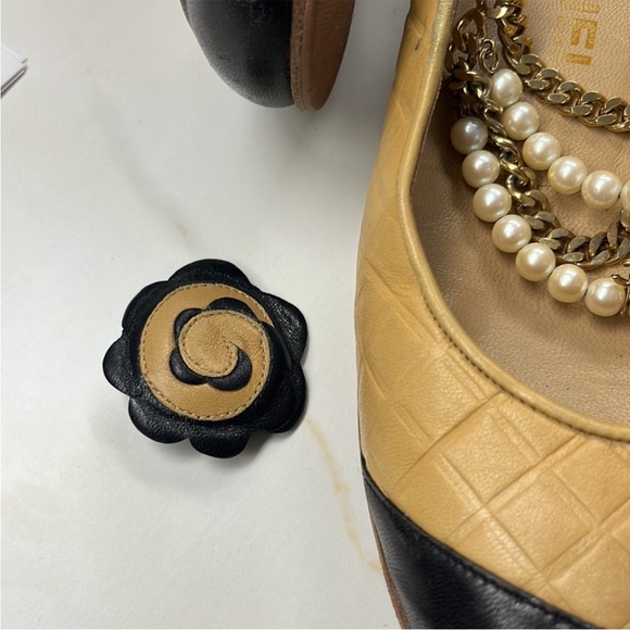 AUTHENTIC CHANEL Black and Tan Flats with Pearl Embellishments - Picture 11 of 13